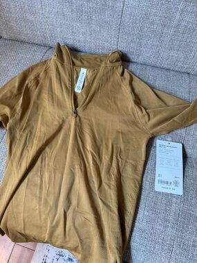 Athleta Long Sleeve Quarter-Zip Top in Mustard